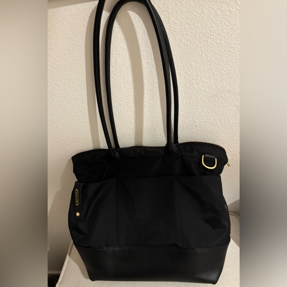 R. Riveter Black Nylon Harriett Tote Bag with leather handles. Great condition.